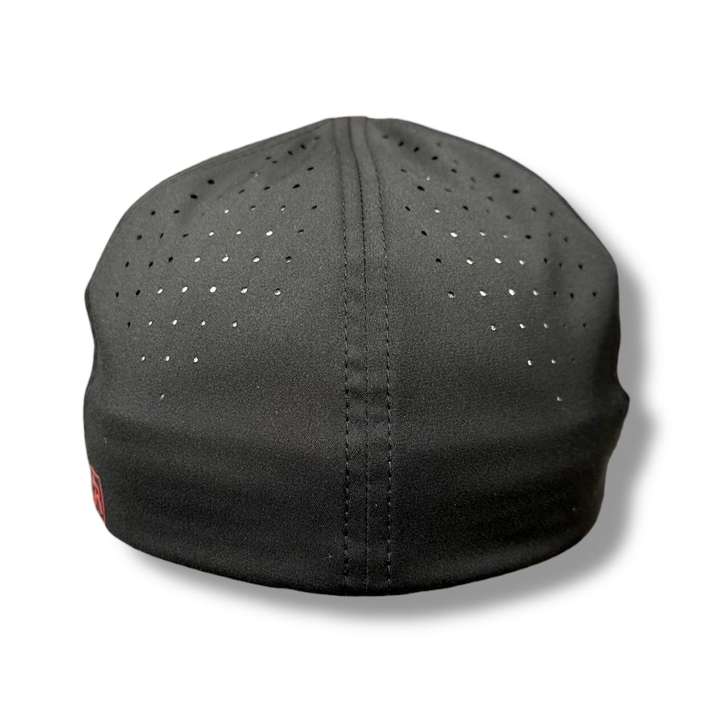 Backside of a black flex fit hat, with perforations on top for added breathability.