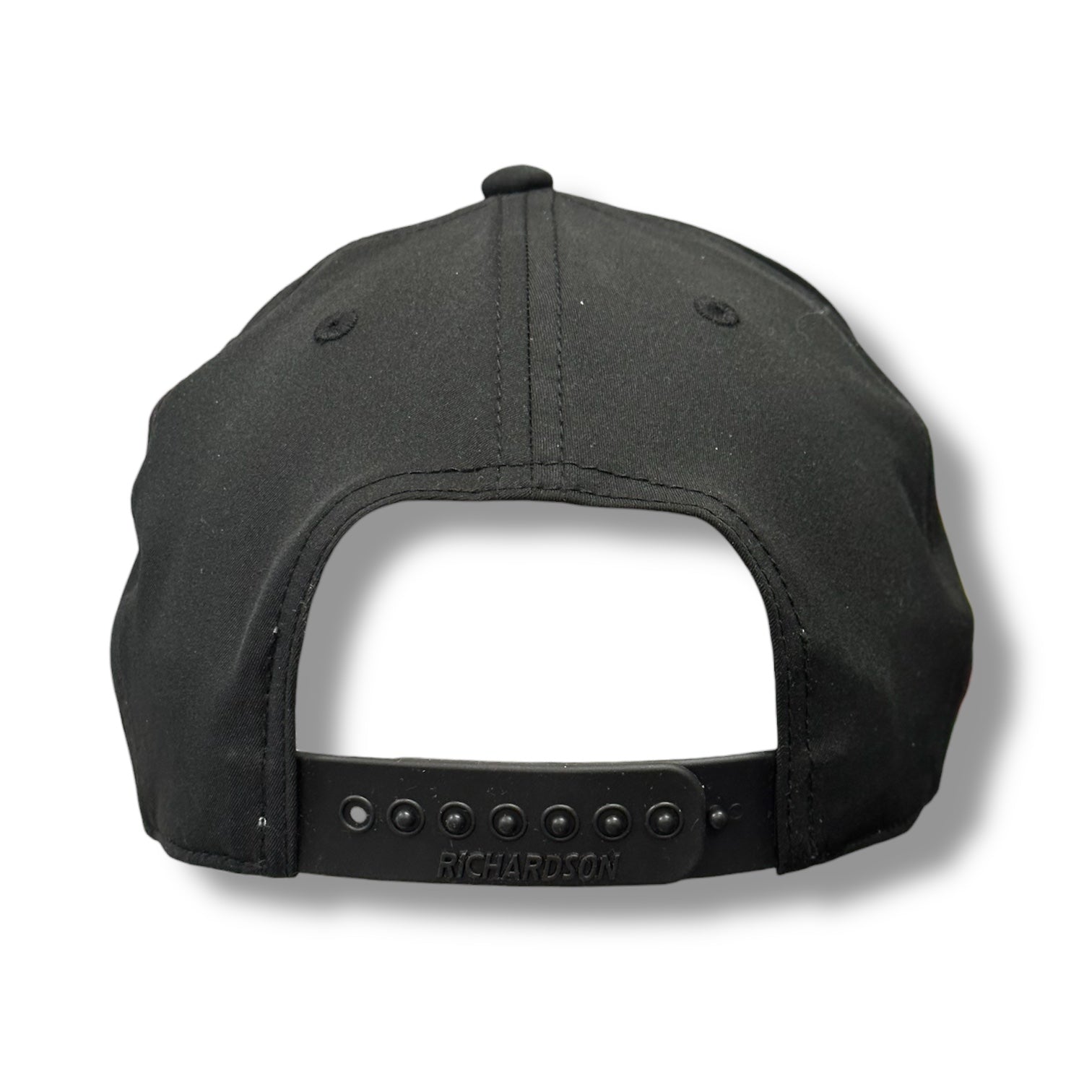 Backside of a black snapback Richardson hat, with black snapback clasp.