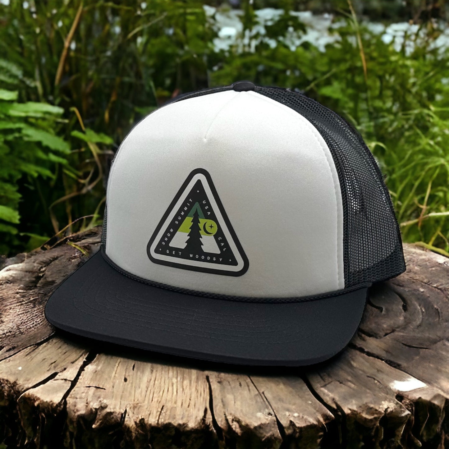 White and black trucker hat with Snow Summit Woodsy logo
